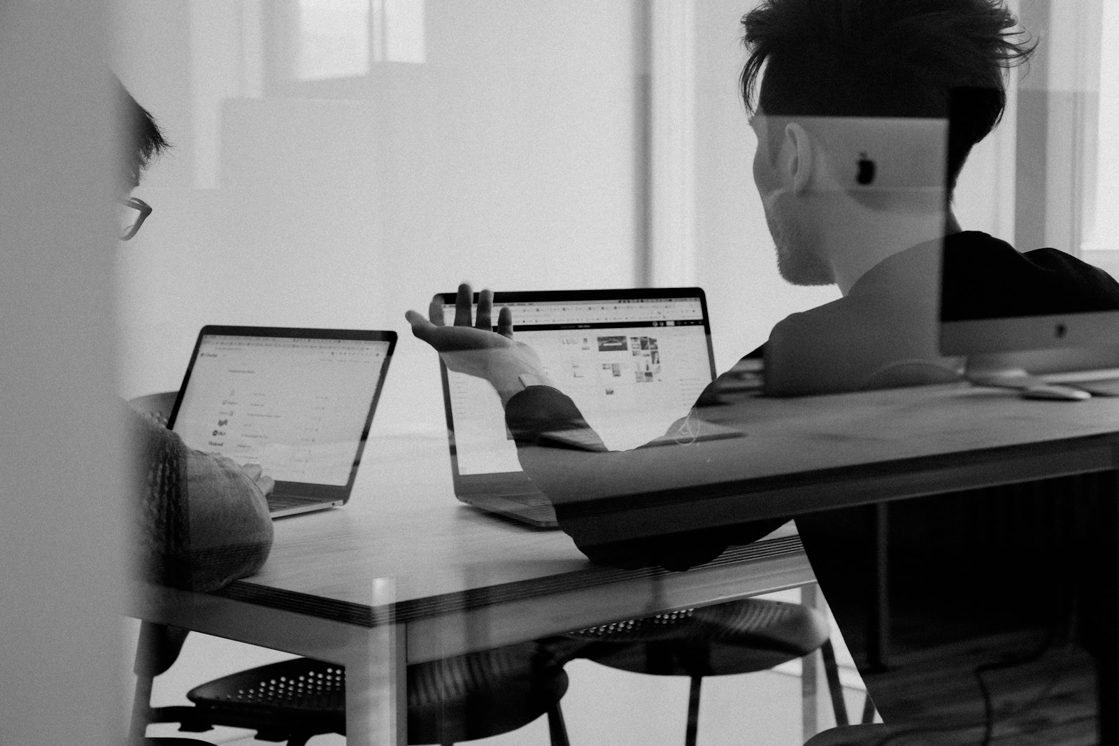 Team reviewing a sales support plan in a meeting