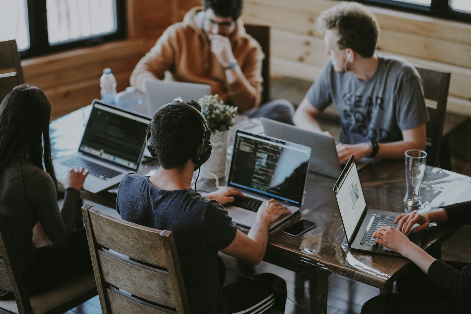 Sales support specialists working through a shared account review