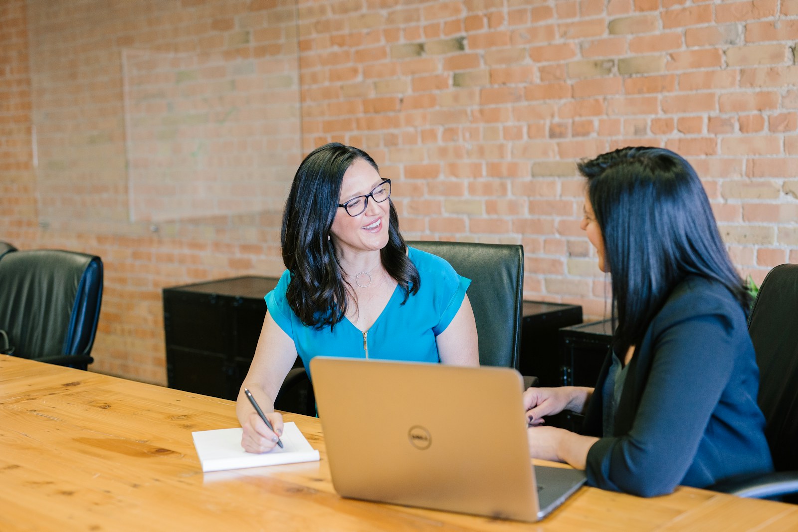 Sales specialist reviewing prospect research in a conversation